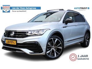 Volkswagen Tiguan 1.4 TSI eHybrid R-Line Business | Incl. 12 maanden Garantie | Panorama dak | Stoel/stuurverwarming | 360* Camera | Elektrisch verstelbare stoelen met memory | Achterbank verwarmd | Keyless enry/start | Adaptieve cruise | Lane assist | IQ.Lights | Dodehoekdetectie | Elektrische kofferbakklep | Draadloze telefoonlader | Sfeerverlichting | Apple CarPlay/Android auto | Climate controle | Navigatie | 20 Inch LMV |
