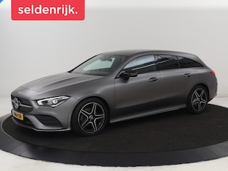 Mercedes-Benz CLA 180d Business Solution AMG | Stoelverwarming | Carplay | Camera | Leder/Alcantara | Navigatie | Widescreen | Sfeerverlichting | Designo Mountaingrijs Magno