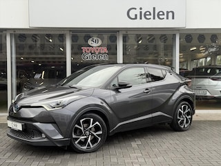 Toyota C-HR 1.8 Hybrid Bi-Tone Plus | Leer, Stoel + Stuurverwarming, Navigatie, Dodehoekherkenning, Parkeersensoren
