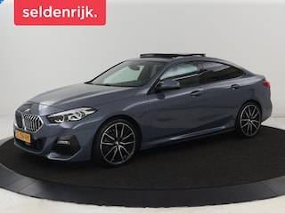 BMW 218i M Sport | Panoramadak | Leder | Stoelverwarming | Carplay | Sfeerverlichting | Live Cockpit | Sportstoelen | Navigatie | Full LED