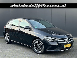 Mercedes-Benz B 180 Aut. LED Sportstoel Camera Navi Cruise PDC Trekhaak NL-auto