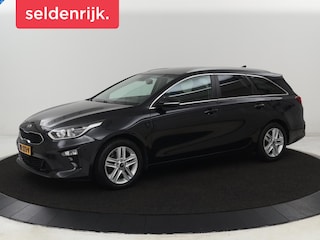 Kia Ceed 1.0 T-GDi DynamicPlusLine | Trekhaak | Stoel & stuurverwarming | Camera | Carplay | Navigatie | Climate control | Parkeerhulp | Cruise control | Half leder