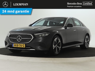 Mercedes-Benz E-klasse 300 e Luxury Line | Rijassistentiepakket plus | Keyless Go | Stuur- en Stoelverwarming | Apple CarPlay | Achteruitrijcamera | Inclusief 24 maanden MB Certified garantie voor Europa.