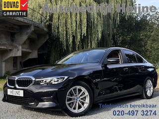 BMW 320e BUSINESS+ EDITION LEDER/CAMERA/TREKHAAK