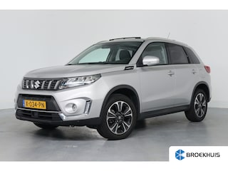 Suzuki Vitara 1.5 Hybrid Style | Panoramadak | Camera | Keyless | Adaptive Cruise | Stoelverwarming | Dodehoek waarschuwing | Leder / Alcantara | Navigatie