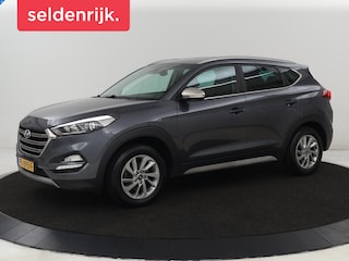Hyundai Tucson 1.6 GDi Comfort | Trekhaak | Camera | Achterbankverwarming | Navigatie | Stoelverwarming | Climate control | Parkeerhulp | Cruise control | DAB | Regensensor