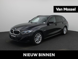 BMW 3-serie Touring 320e AUTOMAAT | ELEKTRISCH WEGKLAPBARE TREKHAAK | ADAPTIEVE CRUISE | NAVIGATIE | MEMORY | SPORTSTOELEN | LEDER | CLIMA | ELEKTRISCHE STOEL | 12 MAANDEN BOVAG GARANTIE |