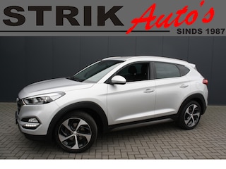 Hyundai Tucson 1.6 T-GDi 177PK Premium - LEDER - NAVIGATIE - CAMERA - TREKHAAK - PDC