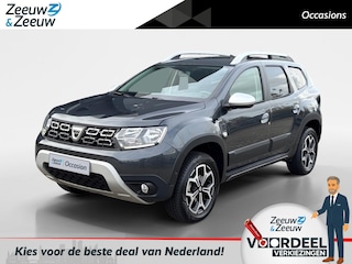 Dacia Duster 130PK TCe Prestige | Trekhaak (1500 KG) | Navi | Camera | Apple CarPlay/Android Auto | Armsteun | Cruise Control | Airco | Lichtmetalen Velgen |