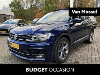 Volkswagen Tiguan 2.0 TDI Highline 150 PK DSG | Automaat | R-Line Exterieur | Trekhaak | Panoramadak | Elektrische Achterklep | Digital Cockpit Pro | Achteruitrijcamera | Stoelverwarming | Navigatie | Climate Control | Park Assist | Adaptive Cruise Control | Grootlicht Assistent | Parkeersensoren | DAB Radio | Bluetooth |