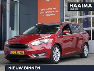 Ford Focus Wagon 1.0 First Edition | Stoel en stuurverwarming | Trekhaak | Navigatie | Elektrische ramen | Keyless start | Lichtmetalen velgen | Voorruitverwarming | Cruise control | Parkeersensoren voor en achter