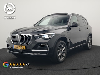 BMW X5 xDrive45e High Executive Plug In Hybrid 395pk Dealer O.H PHEV | Trekhaak Af Fabriek | Luchtvering | Panodak | Head Up | Adaptive Cruise | 360 Camera | Adaptief Onderstel | Lederen Sportstoelen Memory & Verwarmd | Apple Carplay | Sfee