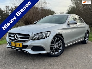 Mercedes-Benz C-klasse 180 Ambition Automaat / Apple Carplay / Navi. / Climate control / 17" Velgen / PDC / Cruise / LED /