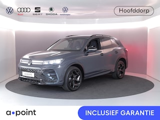 Volkswagen Tiguan 1.5 eHybrid R-Line Edition 272 pk Automaat (DSG) | Verlengde garantie | Navigatie | Parkeersensoren (Park assist) | Rondomzicht camera | Stoelverwarming v/a | Black Style pakket | R-Line |