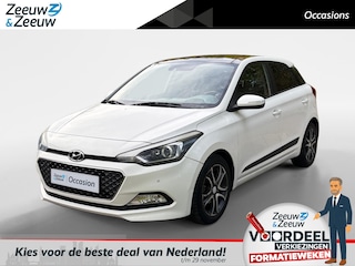 Hyundai i20 1.2 HP i-Motion Premium Navigatie , panoramadak ,  lm velgen , climate , cruise , parkeersensoren , tel , usb . velgen worden nog hersteld in het zwart .