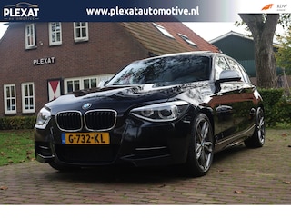 BMW M135i xDrive High Executive Aut. | M-Pakket | Harman-Kardon | Sportstoelen | Prof. Navi | Schuif-Kanteldak | NAP |