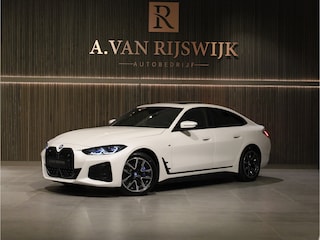 BMW i4 eDrive40 M Sport Edition 84 kWh | SCHUIFDAK | ADAPTIVE | KEYLESS | HUD | STOELVERW.