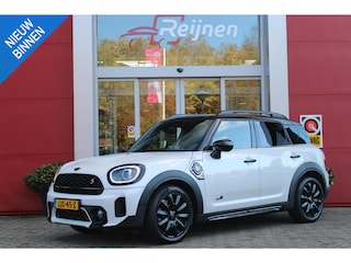 Mini Countryman 2.0 Cooper S E 220PK ALL4 CHILI | UNION JACK ACHTERLICHTEN | LEDEREN BEKLEDING | ELEKTRISCH BEDIENBARE VOORSTOELEN MET GEHEUGENFUNSCTIE OP DE BESTUURDERSSTOEL | STOEL/VOORRUIT VERWARMING | FULL LED KOPLAMPEN | DRAADLOZE APPLE CARPLAY/ANDROID AUTO | DRAADLOZE TELEFOONLADER | NAVIGATIE | EXTRA GETINTE ACHTERRUITEN | ZWART DAK | 18" LICHTMETALEN VELGEN BLACK 10 SPAAKS | ACHTERUITRIJ CAMERA | PARKEERSENSOREN VOOR EN ACHTER | CLIMATE CONTROL | KEYLESS ENTRY/START | HUD (HEAD UP DISPLAY) | ADAPTIVE CRUISE CONTROL | DAB+ RADIO | DONKERE HEMEL BEKLEDING |