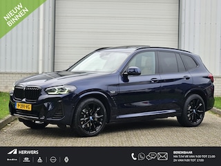 BMW X3 xDrive30e High Executive / Schuif- en Kantel Dak / Lederen Bekleding / Elektrisch Verstelbare Stoelen met Geheugen / Stoelverwarming / Apple Carplay & Android Auto (draadloos) / Elektrische Achterklep / Achteruitrijcamera /