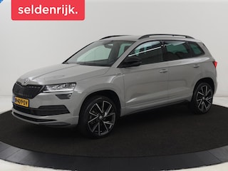 Skoda Karoq 1.5 TSI Sportline | Trekhaak | Stoelverwarming | Camera | Carplay | Virtual Cockpit | Sportstoelen | Navigatie | Full LED | Parkeerhulp | Sfeerverlichting | Climate control | Cruise control