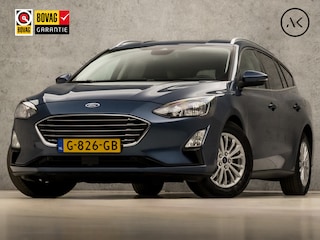 Ford Focus Wagon 1.0 EcoBoost Titanium Sport Automaat (APPLE CARPLAY, GROOT NAVI, CAMERA, CLIMATE, TREKHAAK, ADAPTIVE CRUISE, SPORTSTOELEN, GETINT GLAS, LM VELGEN, NIEUWSTAAT)