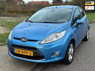 Ford Fiesta 1.25 Titanium 5-Drs ECC Audio/CD ABS Cruisecontrol Colorpakket Achterspoiler LMV 15" ESP Dealeronderh. Apk 30/06/2026