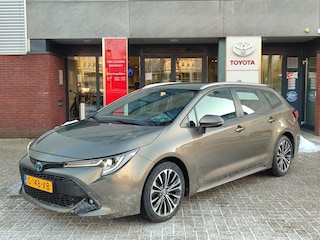 Toyota Corolla Touring Sports 2.0 Hybrid BUSINESS INTRO TREKHAAK STOELVERW HEAD-UP PARK-SENSOREN NAVI CLIMA AD-CRUISE LM-VELGEN BLUETOOTH NL-AUTO 1E-EIG