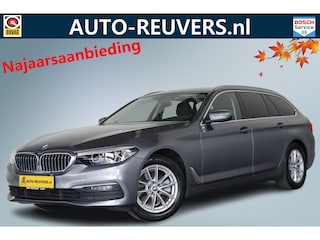 BMW 5-serie Touring 520i Business Edition Cruise / Navi / Carplay / Camera