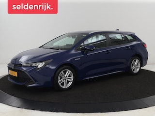 Toyota Corolla 1.8 Hybrid Business | 1e eigenaar | Trekhaak | Carplay | Camera | Adaptive cruise | Full LED | DAB | Climate control