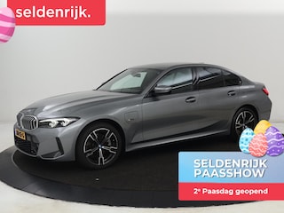 BMW 320e M Sport | Trekhaak | Stoelverwarming | Camera | Leder/Alcantara | Stuurverwarming | Carplay | Live Cockpit Plus | Adaptief LED | Sportstoelen | Cruise control | PHEV | Plug In