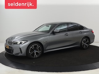 BMW 320e M Sport | Trekhaak | Stoelverwarming | Camera | Leder/Alcantara | Stuurverwarming | Carplay | Live Cockpit Plus | Adaptief LED | Sportstoelen | Cruise control | PHEV | Plug In