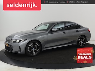 BMW 320e M Sport | Trekhaak | Stoelverwarming | Camera | Leder/Alcantara | Stuurverwarming | Carplay | Live Cockpit Plus | Adaptief LED | Sportstoelen | Cruise control | PHEV | Plug In