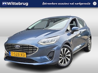 Ford Fiesta 1.0 EcoBoost Hybrid Titanium | Parkeersensoren | Keyless Entry | Stoel en Stuurverwarming | Voorruitverwarming | Navigatie via Apple Carplay of Android Auto |