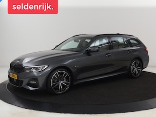 BMW 320e M Sport | Adaptive cruise | Leder | Trekhaak | Stoelverwarming | 360 Camera | Laserlicht | Carplay | Sfeerverlichting | Live Cockpit | Keyless | Sportstoelen | DAB | Navigatie | PHEV | Plug In