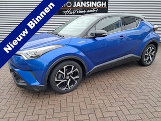 Toyota C-HR 1.8 Hybrid Bi-Tone plus | Clima | Cruise | Vol leder | Navigatie | JBL Geluidssysteem | LM Velgen | Keyless | Camera | RIJKLAARPRIJS INCL 12 MAANDEN GARANTIE EN BEURT