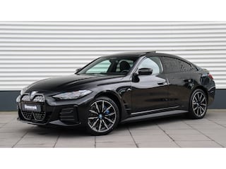 BMW i4 eDrive35 High Executive M-Sport | Harman/Kardon | Schuifdak | Head-up | Trekhaak | Driving Assistant Professional