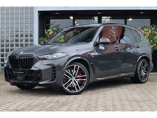 BMW X5 xDrive50e | Dravitgrau, M Sportpakket Pro, Sportstoelen, Massage, Carbon interieur, Driving Assistant Professional, Harman/Kardon, Trekhaak, Panoramadak, Zitklima, Stuurverwarming