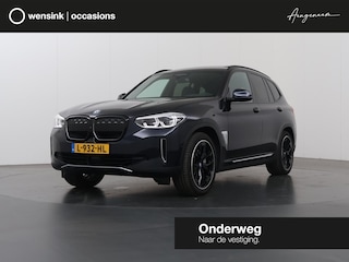 BMW iX3 High Executive 80 kWh | SOH 95% | Adaptieve Cruise Control | Panoramadak | Apple Car Play/ Android Auto | Ele.verstelbare stoelen + Geheugen | Camera | Sportstoelen | Navigatie | Stoelverwarming |