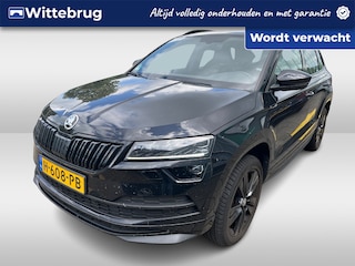 Skoda Karoq 1.5 TSI ACT Sportline Business / Digitaal dashboard / Camera / Parkeersensoren V+A / App connect / Navigatie / Zwenkbare trekhaak /