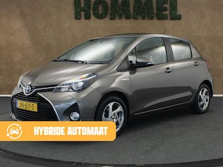 Toyota Yaris 1.5 Hybrid Trend - ORIGINEEL NEDERLANDSE AUTO - AFKOMSTIG VAN 2E EIGENAAR - VOLLEDIG ONDERHOUDEN - ALLE BOEKJES AANWEZIG- NAVIGATIE - CLIMATE CONTROL - LEDEREN STUUR - BOTSWAARSCHUWINGSSYSTEEM - 15 INCH LICHT METALEN VELGEN