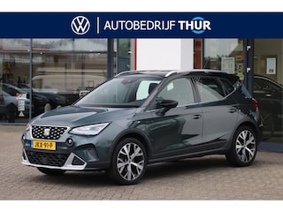 Seat Arona 1.0 TSI Xperience 18" LMV achteruitrijcamera Full LED verlichting full map navigatie ACC adaptieve cruise control parkeersensoren voor en achter zwart dak chrome dakrail en sierlijsten climatronic spiegel pakket vario vloer draadloos carplay navigatie lederen multifunctioneel stuurwiel