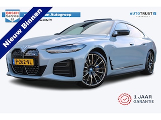 BMW i4 M50 High Executive 84 kWh | Incl. 12 maanden garantie | Assisted driving | Stoel/stuurverwarming | Stoelventilatie | Uitklapbare trekhaak | Head-up display | Memory seat | Schuif/kantel dak | Harman/Kardon | 360° camera |