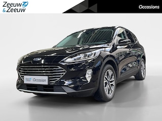 Ford Kuga 2.5 PHEV Titanium 225pk | Dealer onderhouden | Stoel- stuur en voorruitverwarming | Navigatie | All season banden |