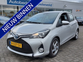 Toyota Yaris 1.5 Hybrid Automaat Trend 5-Deurs | Navi | Clima | Bluetooth Carkit+Streaming | Achteruitrijcamera | Stoelverwarming | Regensensor | Mistlampen | 15''lm
