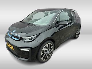 BMW i3 Basis 120Ah 42 kWh / Navigatie / 19'' / Parkeerhulp achter / Navigatie / Harman Kardon / Stoelverwarming / Cruise Control / Warmtepomp / Getint glas