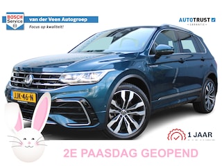 Volkswagen Tiguan 1.4 TSI eHybrid R-Line Business+ | Incl. 12 maanden Garantie | Panorama dak | Memory stand stoelen | Trekhaak wegklapbaar | Stoel & Stuurverwarming | 360* Camera | Climate controle | Adaptive cruise | Elektrische kofferbakklep | Dodehoek detectie | IQ. Lights | Keyless entry/start | Lederen bekleding | Virtual cockpit | Draadloze telefoonlader |