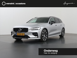 Volvo V60 2.0 B5 R-Design | Panoramadak | Harman/Kardon | Ele.verstelbare stoelen + geheugen | Navigatie | Trekhaak | HUD | Camera | Stoel/Stuurverwarming | Apple CarPlay/Android Auto | Adaptieve Cruise Control | Ele. kofferdeksel |