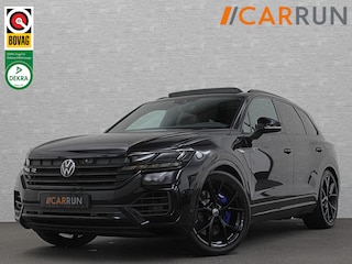 Volkswagen Touareg R 3.0 TSI 462PK E-Hybrid | Luchtvering | Puglia Leder | Panorama | ACC | Trekhaak | 22'' | Stoelventilatie | Nachtzicht | Head-Up | Standkachel | Ergo-Comfort | Sfeerverlichting | 4-Zone Clima | Stuurverwarming | Black-Optic | Dodehoek | Lane-Assist | Carplay | Draadloos Laden | BOVAG Garantie |