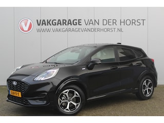 Ford Puma 1.0-125pk EcoBoost Mild-Hybrid ST-Line. Mooie luxe hoogzitter ! Slechts 12.200km ! Autm. airco, adapt. cruise control, stoel-, stuur- en voorraamverw., navigatie, telefoonvoorb., LM wielen, elektr. achterklep, LED verl., camera, pdc v+a etc.