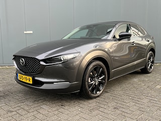 Mazda CX-30 2.0 e-SkyActiv-G M 150pk Hybrid Nagisa | Camera | Carplay | Premium Audio | Adaptive cruise control | Dodehoek detectie | Bestuurdersstoel met geheugen | Elektrische achterklep | Draadloos laden | Head-up display | Stoelverwarming
